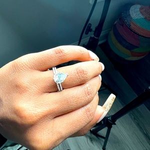 VS1, 1.5 diamond centered, pear ring. Appraisal documents included.